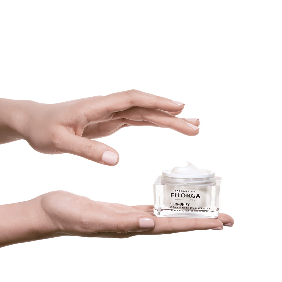 Filorga Skin-Unify Creme Uniformizante Iluminador 50 ml em boião branco com tampa branca.