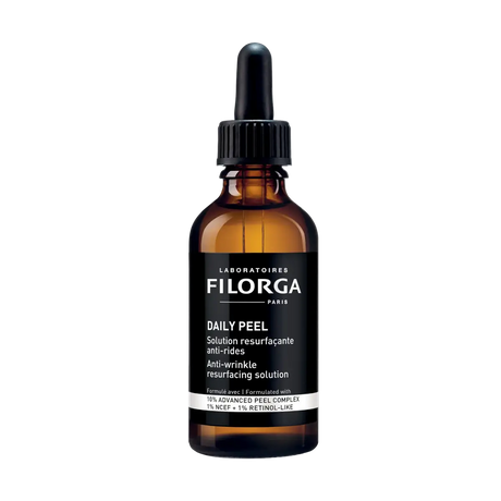 Filorga NCEF-Revitalize Sérum antienvelhecimento de 30 ml em frasco com doseador prateado e base rosa translúcida.