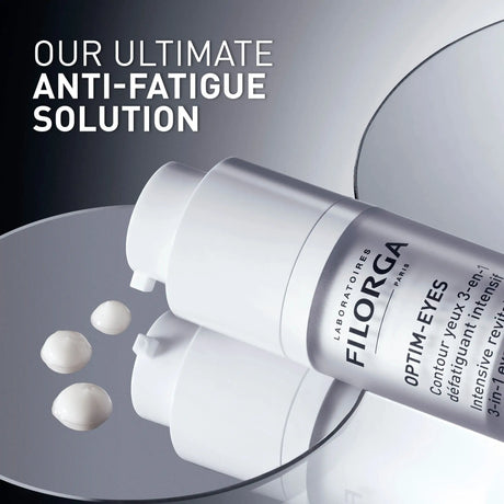 Filorga Optim-Eyes creme de contorno de olhos 3 em 1, frasco airless branco com doseador, 15 ml.