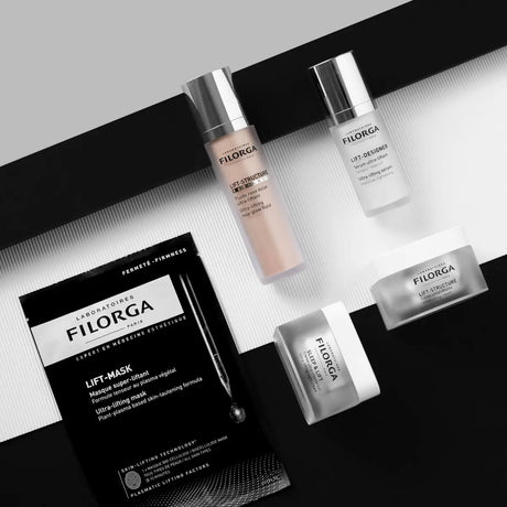 Boião branco e prateado Filorga Sleep & Lift, creme ultra-lifting de noite, 50 ml.