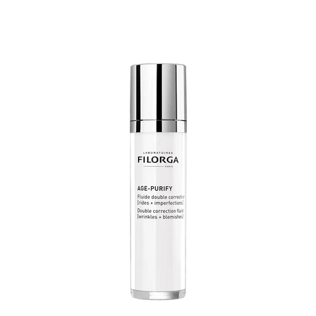 Filorga AGE-PURIFY fluido facial de dupla correção em frasco branco e prateado com doseador, 50 ml.