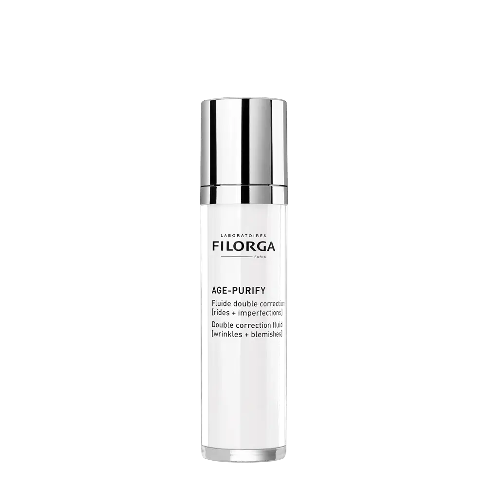 Filorga AGE-PURIFY fluido facial de dupla correção em frasco branco e prateado com doseador, 50 ml.