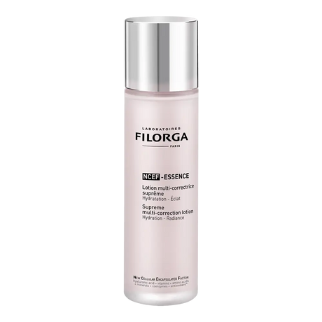 Frasco rosa-claro Filorga NCEF-ESSENCE, loção multicorretora de 150 ml, com tampa prateada.